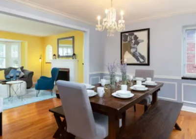 Heritage House dining room with table and chandelier