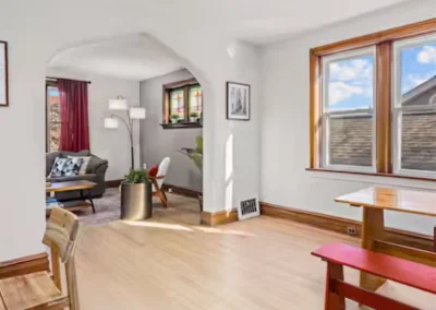 Serene Stay living room seen through an arched doorway