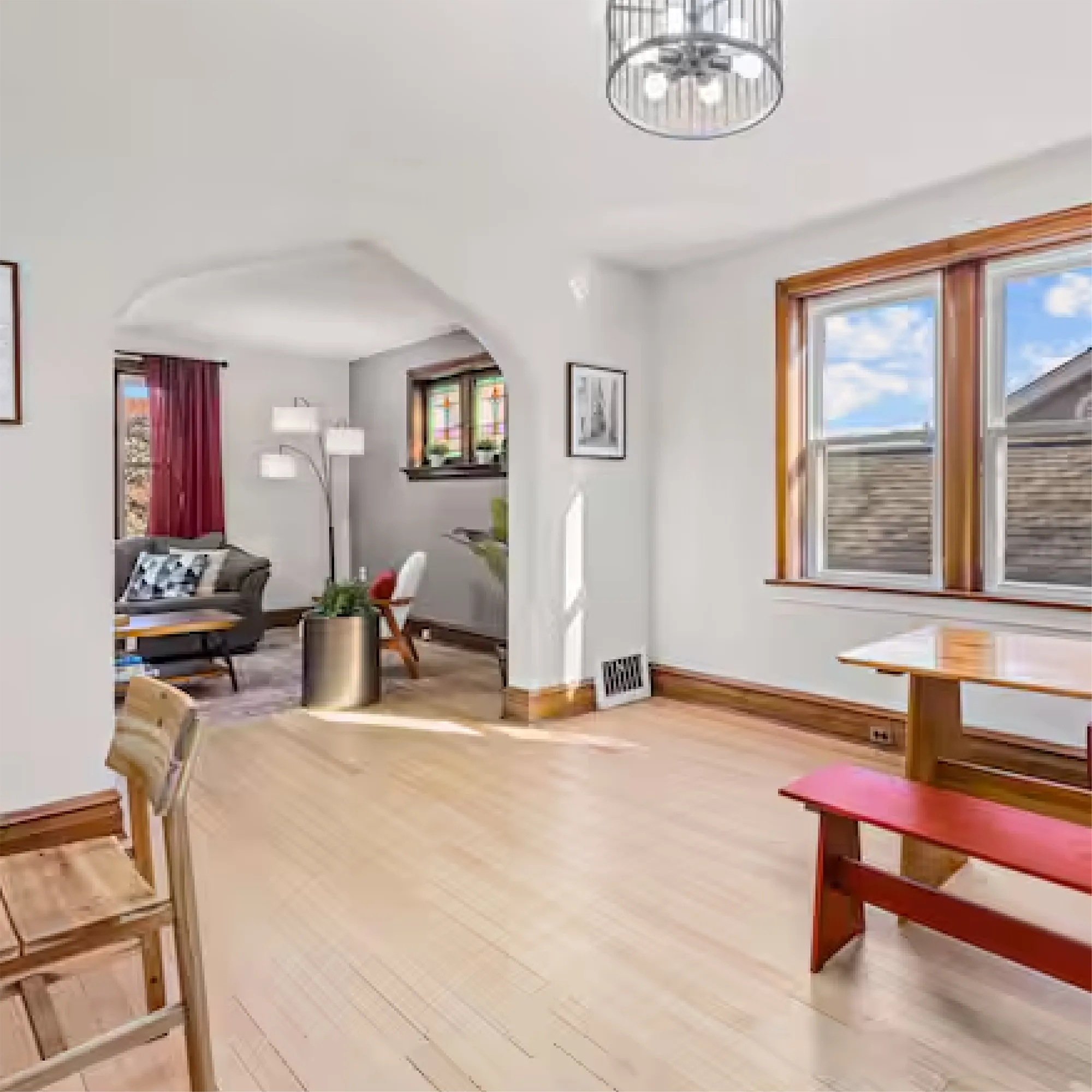 Serene Stay living room seen through an arched doorway