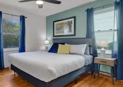 Midtown Classic bedroom with green accent wall