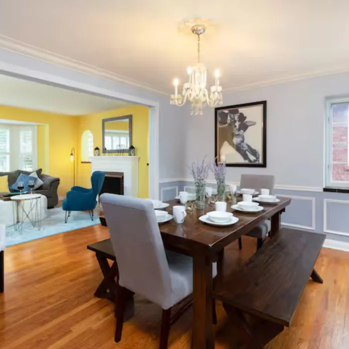 Heritage House dining room with table and chandelier
